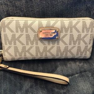 White Michael Kors full zip wallet